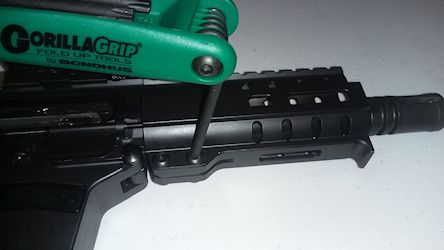 Remove the two T25 torx screws from hand guard