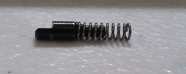 Extractor Plunger (42) and Extractor Spring (45)<br/>In the next picture, it will be inserted in this orientation.