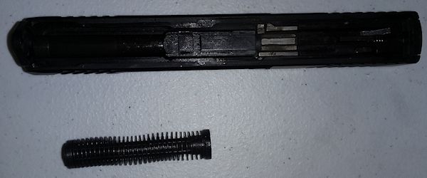 Remove recoil spring assembly